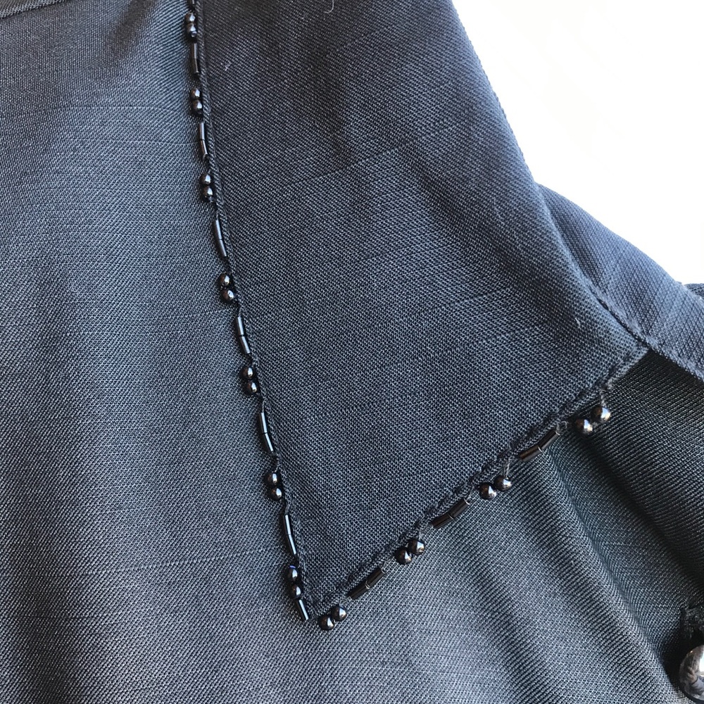 Black dress shirt.